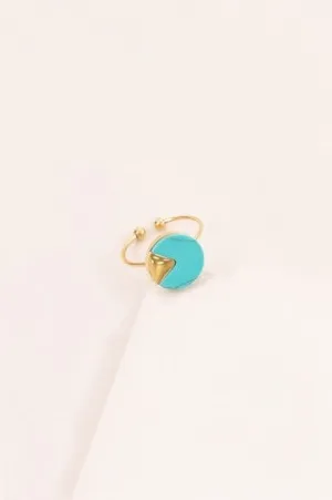 Circle, marble stone ring with a gold peak cut out