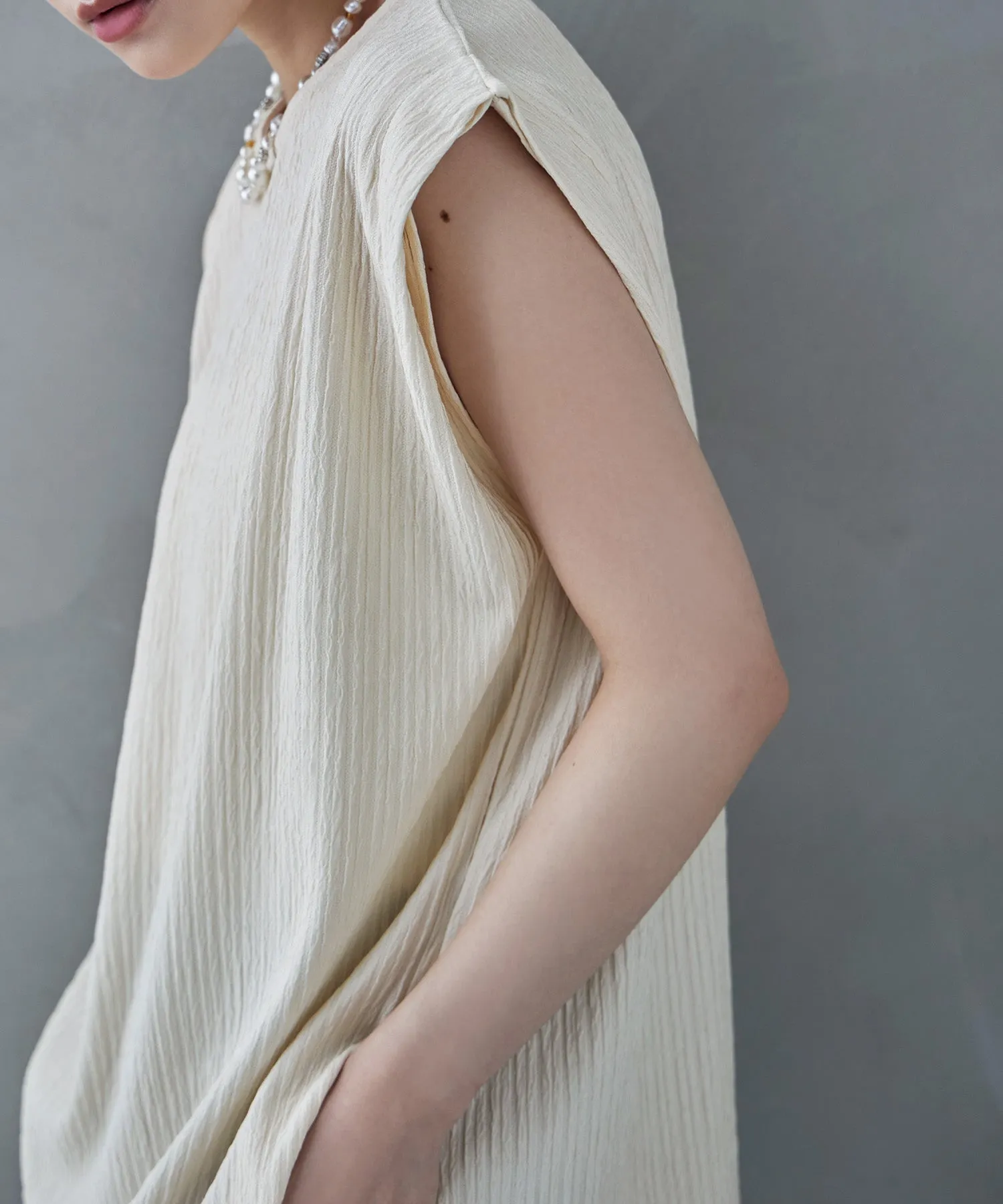 Shiny pleated shoulder tuck tops
